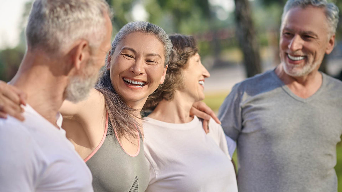 Group of happy adults outdoors representing Liver Detox: Myths, Facts, and Natural Ways to Boost Liver Health, embracing wellness and liver health naturally.