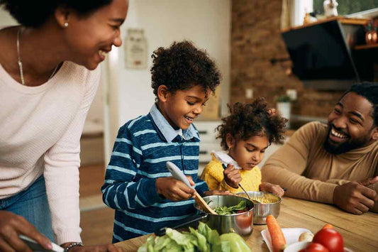 5 Top Reasons to Choose Viridian: Family enjoying healthy meals, powered by Viridian's pure and ethical supplements.