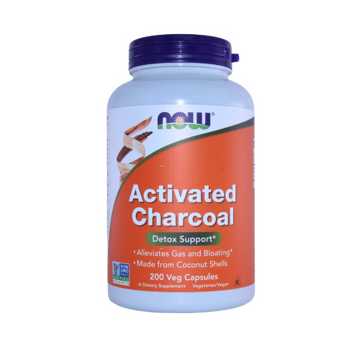 NOW Activated Charcoal supplement bottle's side label with usage instructions, precautions, and benefits for digestive health and bloating relief.